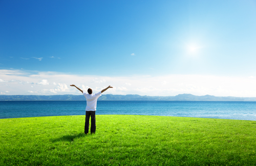 happy young man in sunset time and sea
